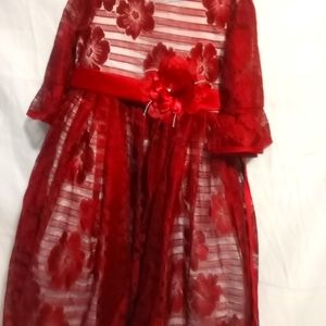 A beautiful red floral dress for girls. Size 120